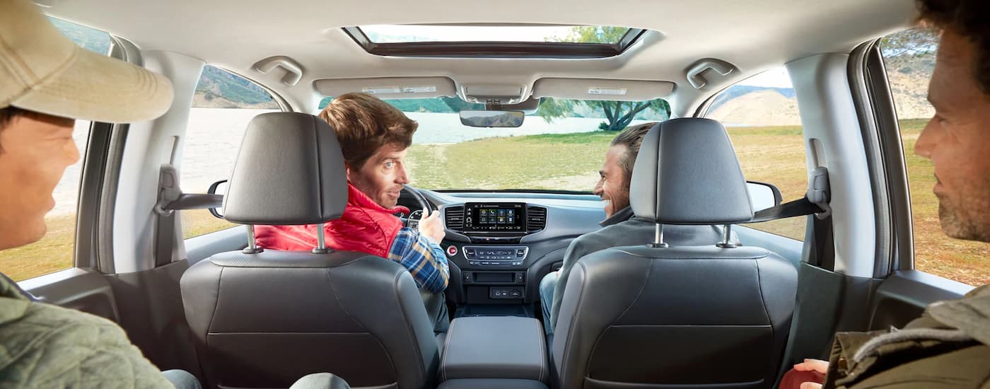Group of friends driving in a 2025 Honda Ridgeline