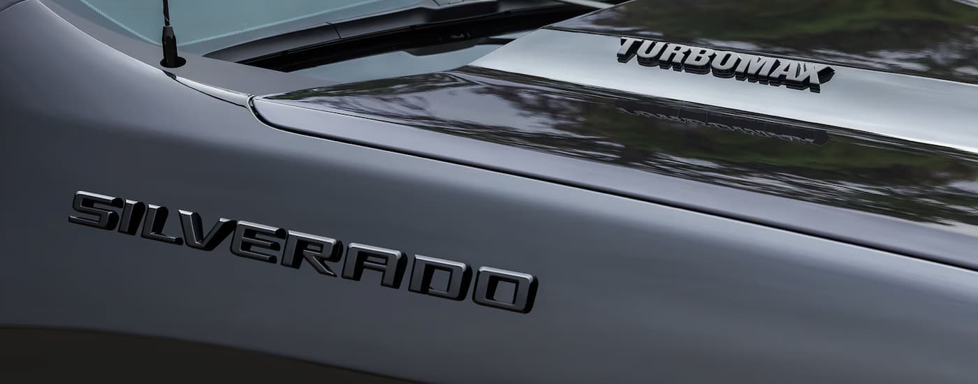Hood of a black 2025 Chevy Silverado 1500 Turbomax
